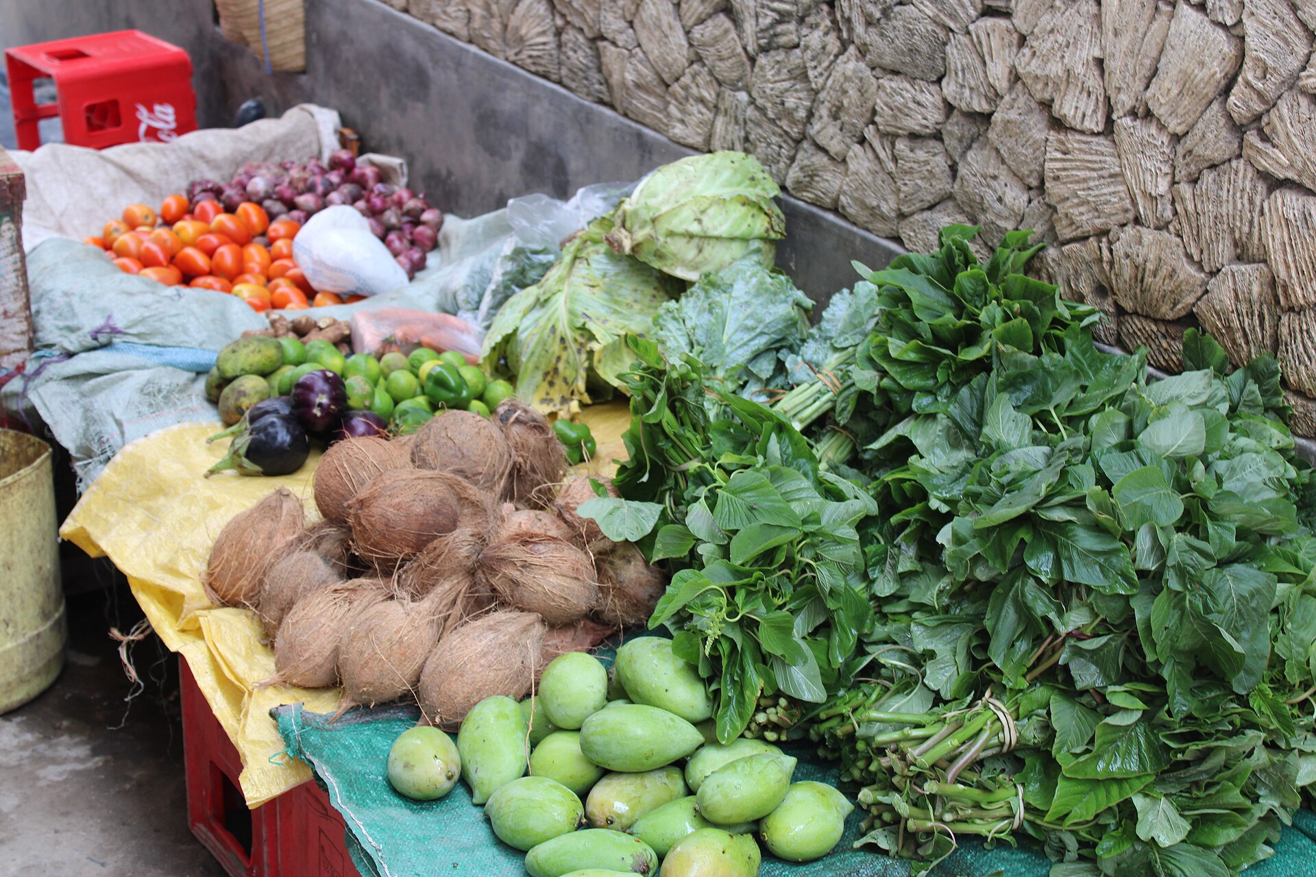 A spread of fresh whole foods arranged on a table.